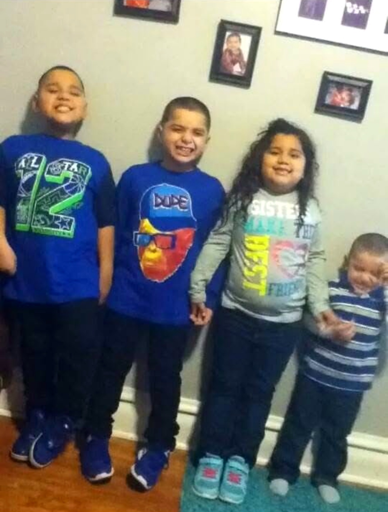 Elvis Escobar's children smiling together